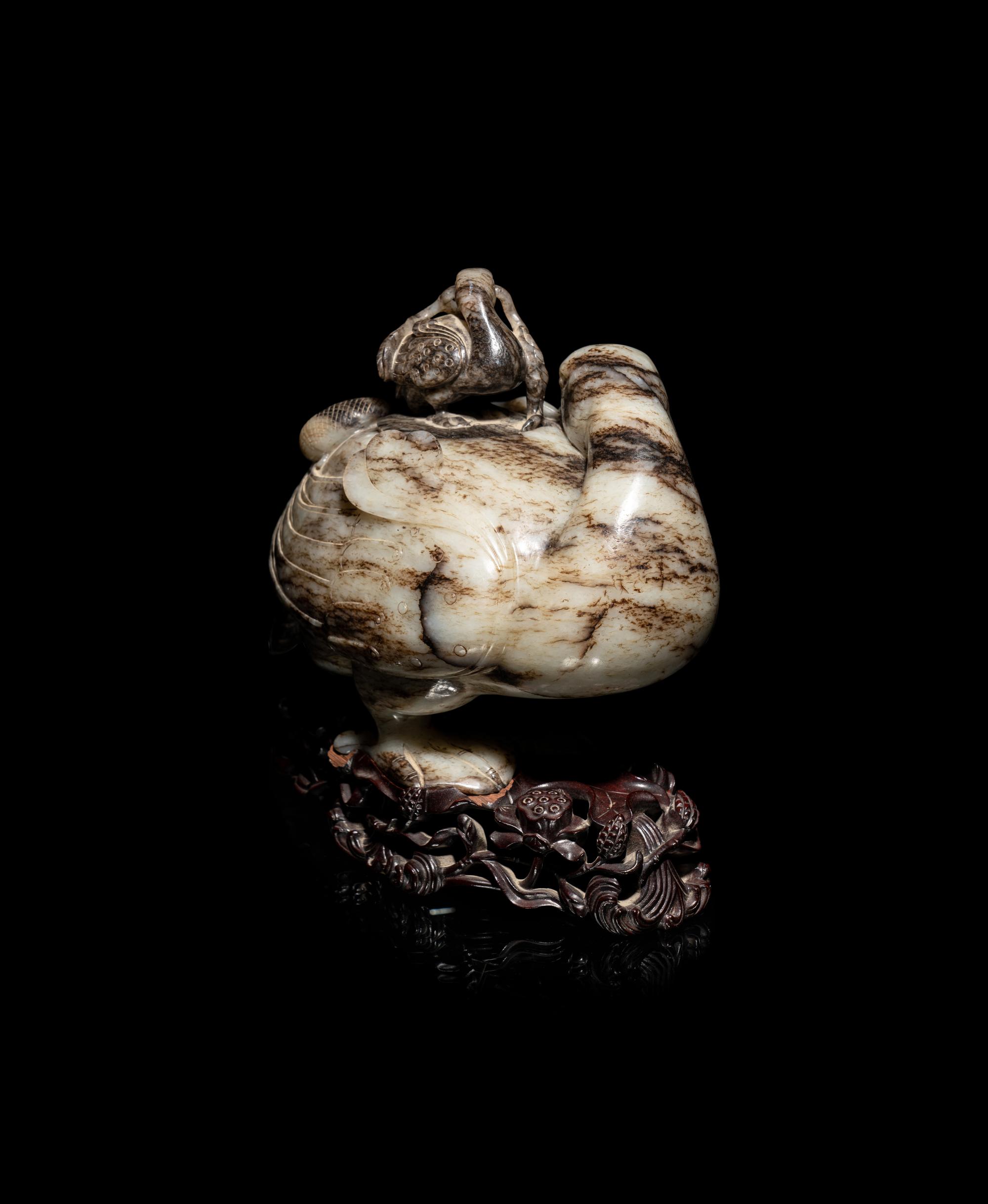 A Chinese Black and White Jade Duck-Form Box and Cover