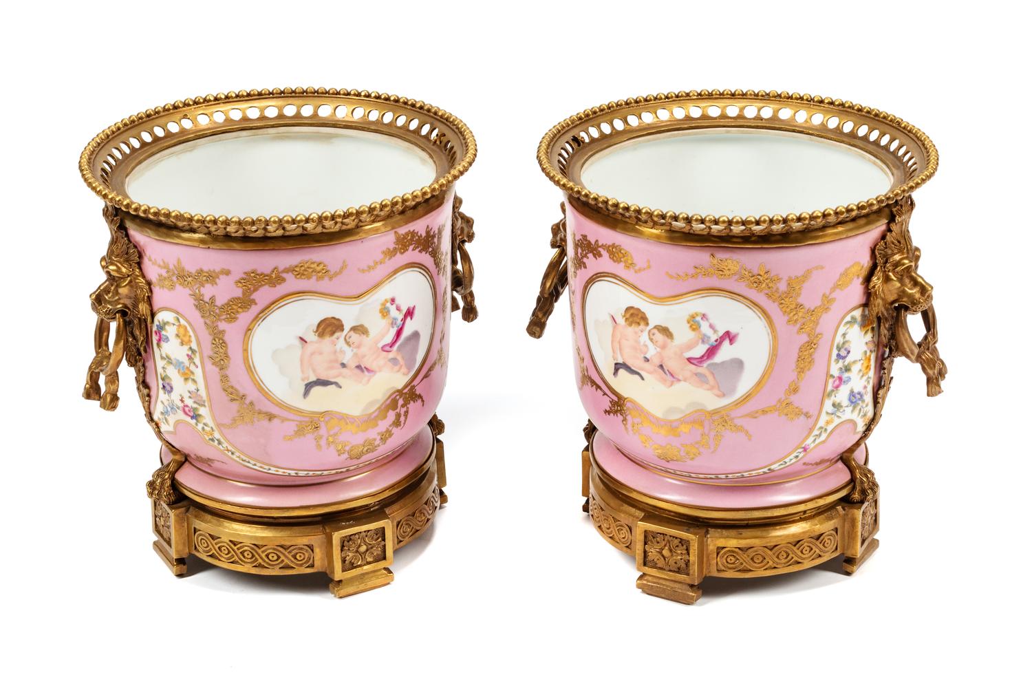 A Pair of Sèvres Style Gilt Bronze Mounted Porcelain Cache Pots