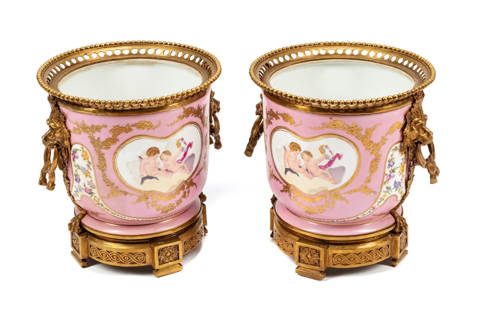 A Pair of Sèvres Style Gilt Bronze Mounted Porcelain Cache Pots