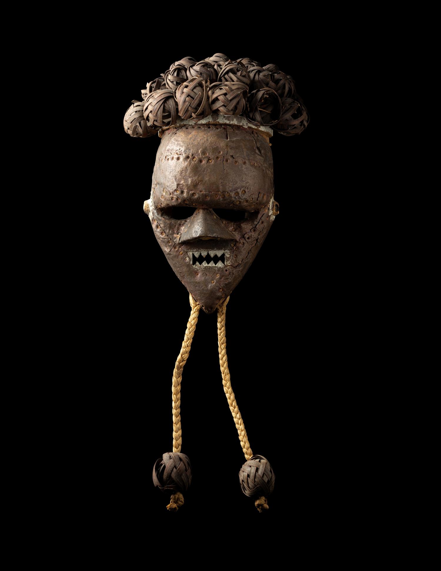 A Salampasu Wood and Copper Headhunter Mask