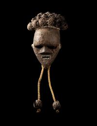 A Salampasu Wood and Copper Headhunter Mask