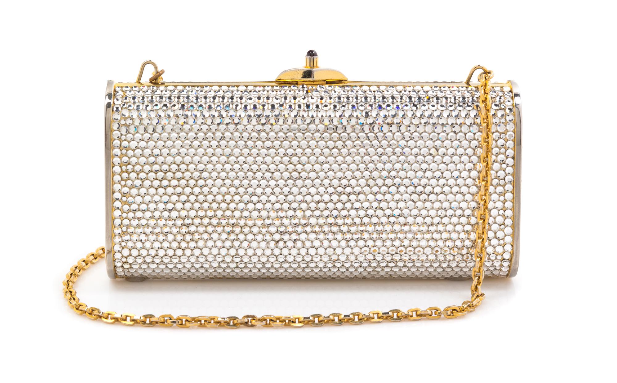 A Judith Leiber Silver Crystal Minaudiere, 5.5" x 2.5" x 1.2".