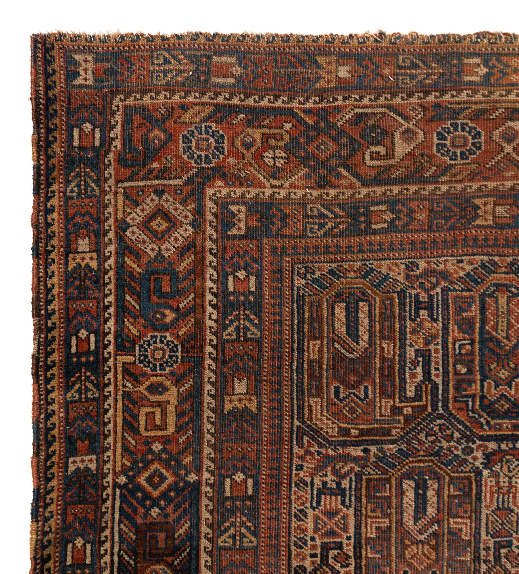 A Caucasian Wool Rug and an Afghan Wool Rug
