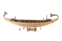 An Egyptian Style Carved Wood Boat Model
