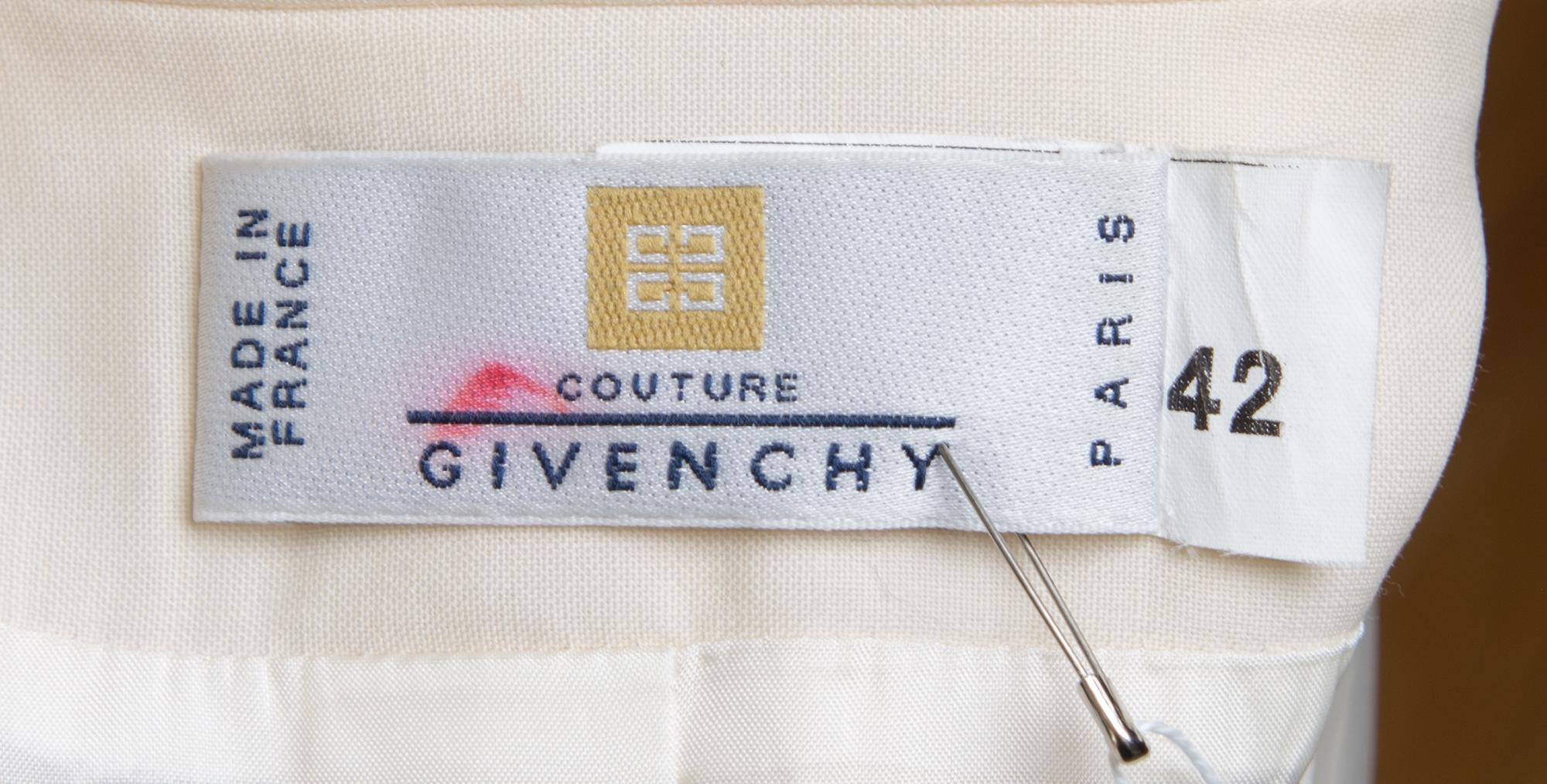 A Givenchy Ivory Wool Double Breasted Tuxedo, Size 42.