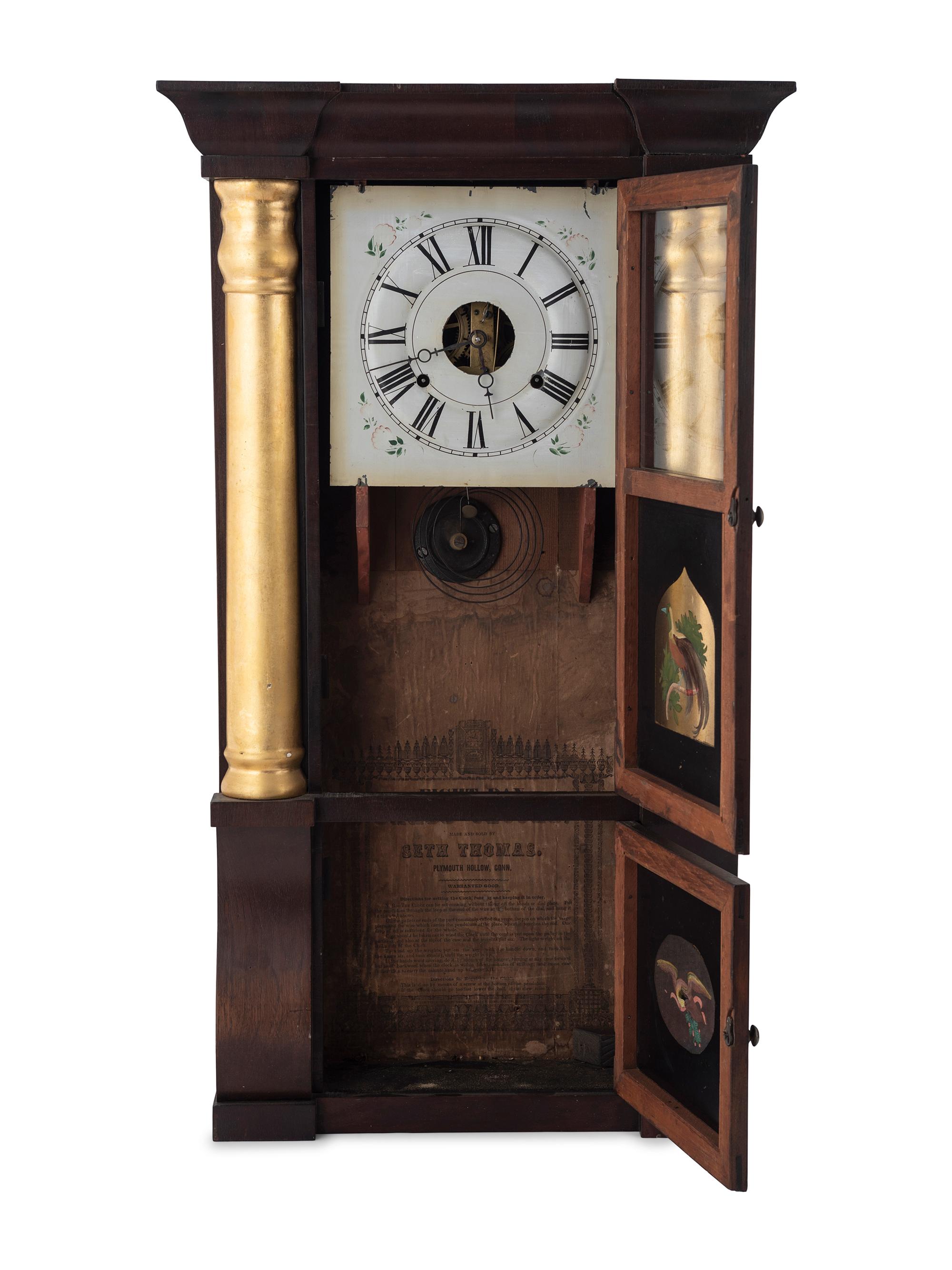 A Seth Thomas Empire Mahogany and Giltwood Shelf Clock