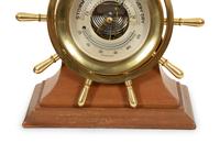 A Chelsea Ship's Wheel Clock and Matching Barometer