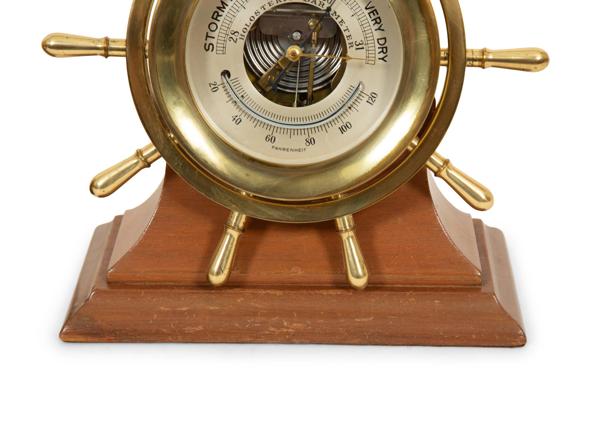 A Chelsea Ship's Wheel Clock and Matching Barometer