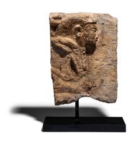 An Egyptian Limestone Fragment with a Dignitary