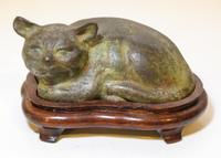 A Bronze Sleeping Cat. Width 6 inches.