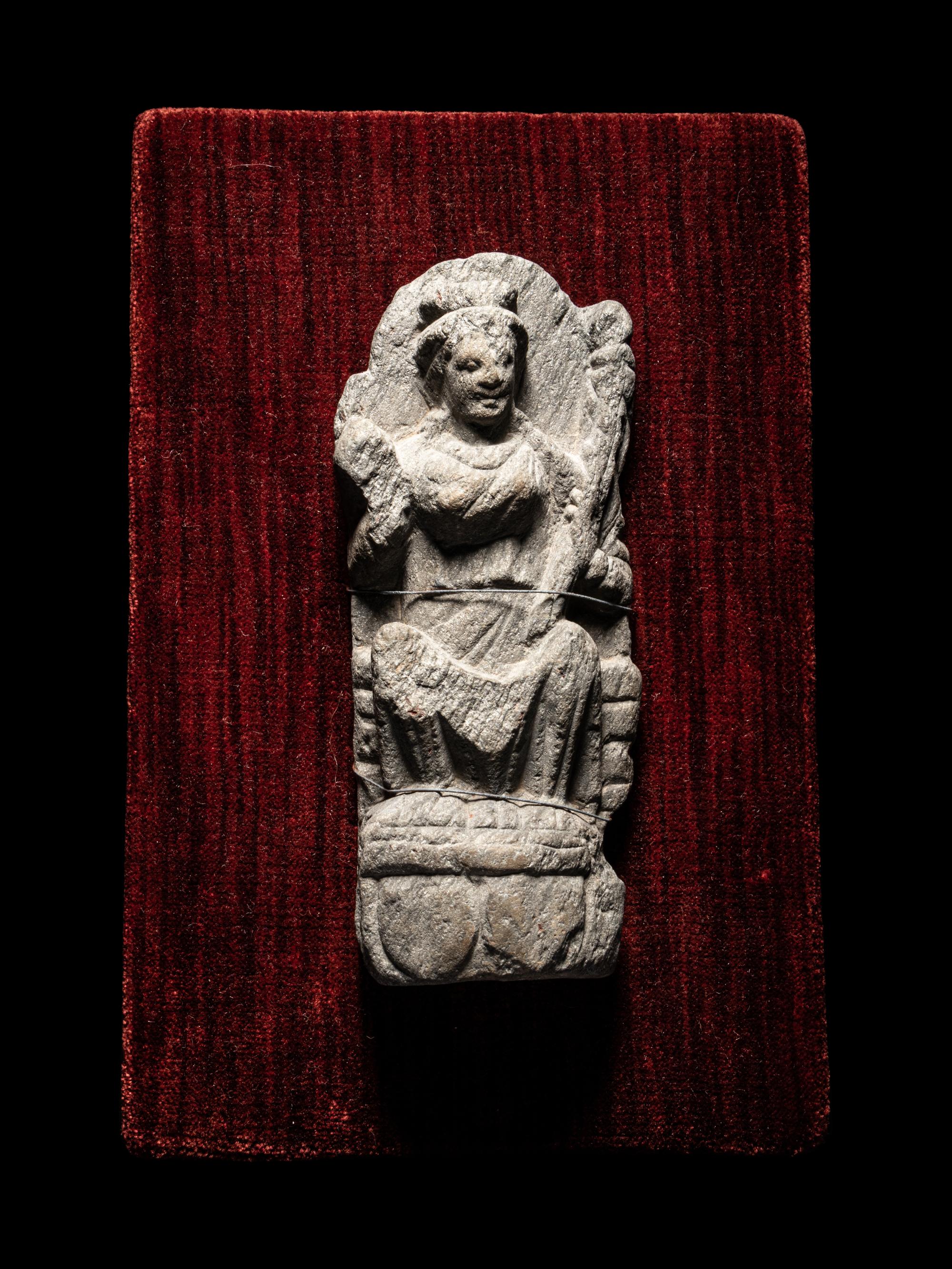 A Gandharan Schist Relief of a Musician