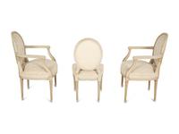 A Pair of Louis XVI Style Oval Back Painted Fauteuils and Matching Side Chair