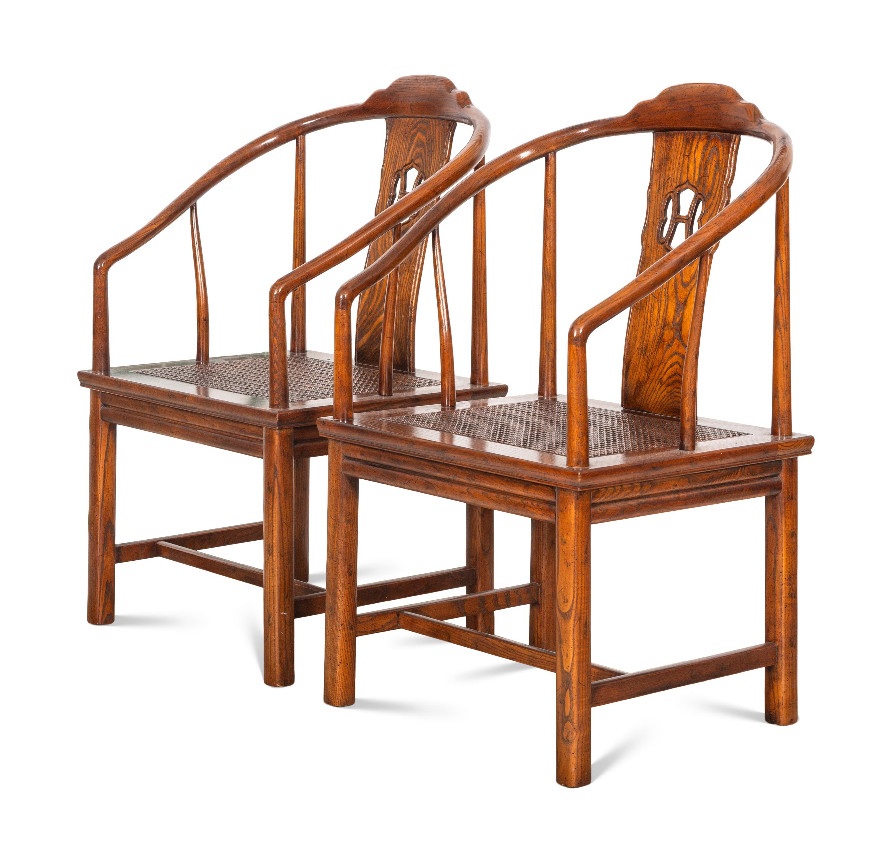 A Pair of Ming Style Horseshoe Back Armchairs