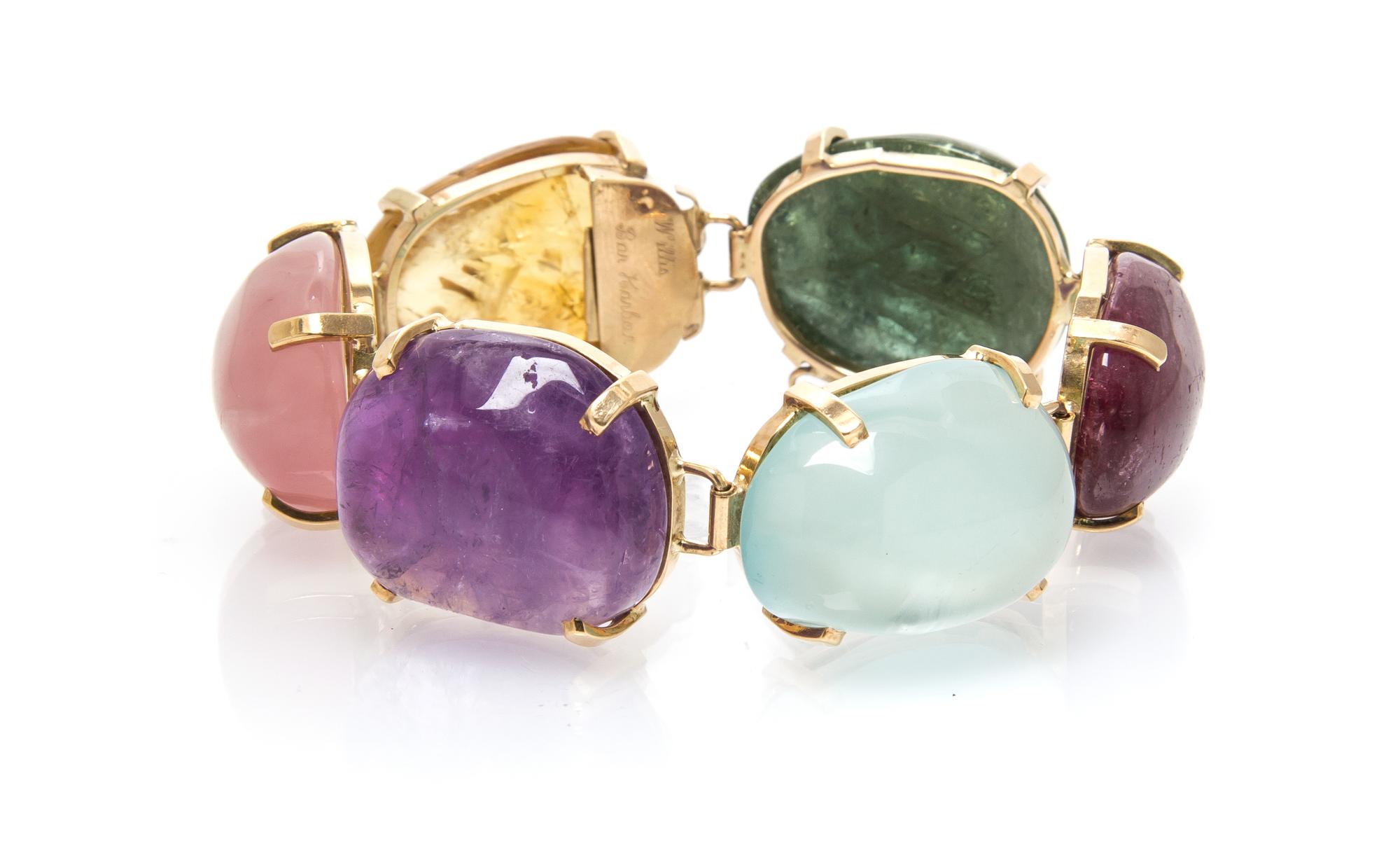A 14 Karat Yellow Gold and Multi Gem Bracelet, 49.30 dwts.