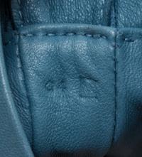 An Hermes Bleu Lin Agneau Clou de Selle Pouch, 6" x 9" x 1".