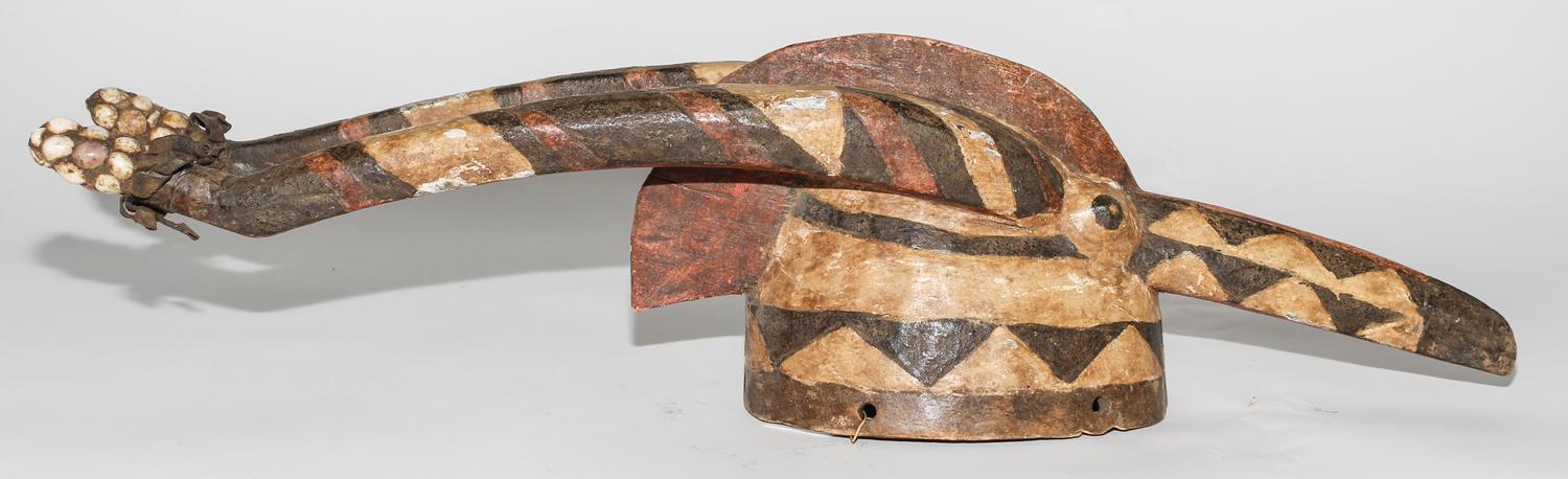 A Guro Polychromed Wood Mask. Height 26 inches.