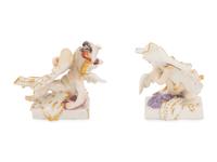 A Pair of Meissen Porcelain Figures of Putti with Cartouches