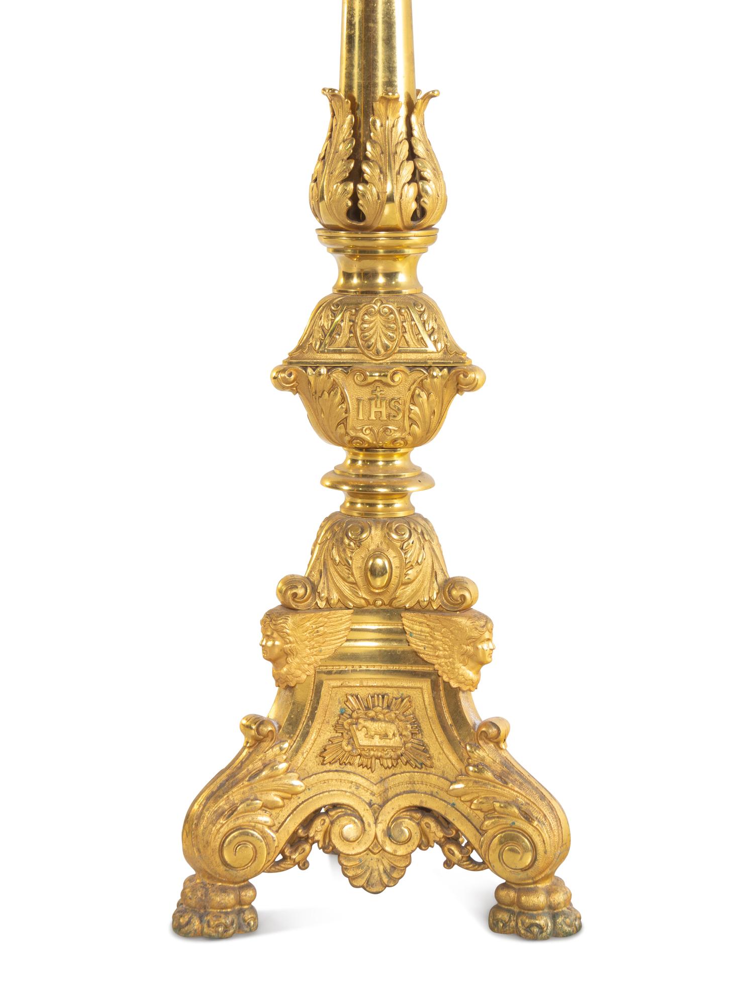 A Pair of Gilt Brass Altar Candlesticks with Associated Marble Tops