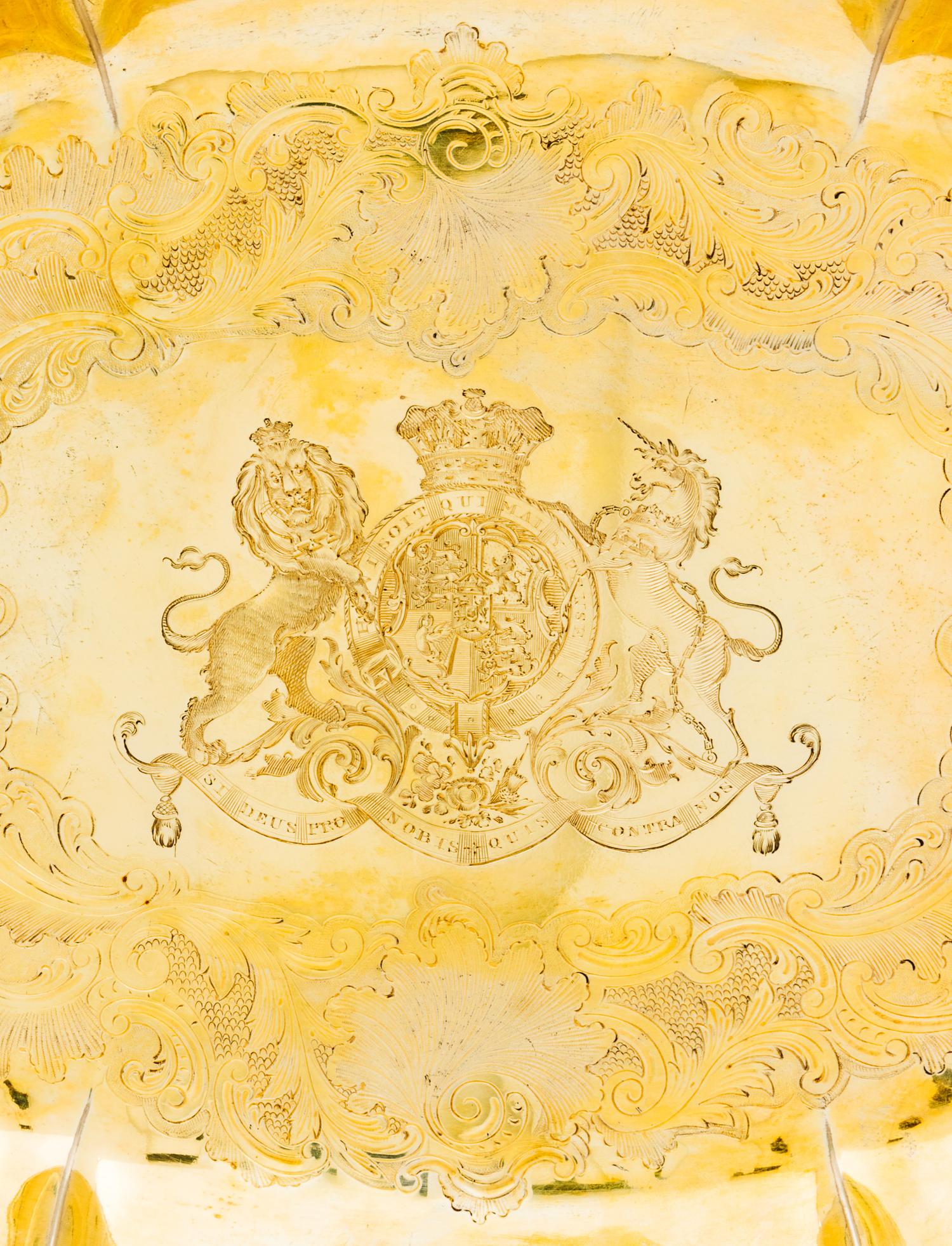 A Belgian Silver-Gilt Serving Dish of English Ducal Interest, Maker's Mark GV, Liege, 18th Century, of oval form, the undulating rim ch