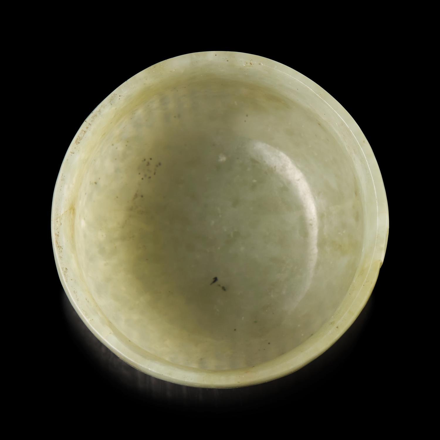 A Chinese Celadon Jade "Rice Measure" Cup, Late Ming-Early Qing — 明末清初 笸籮紋玉碗