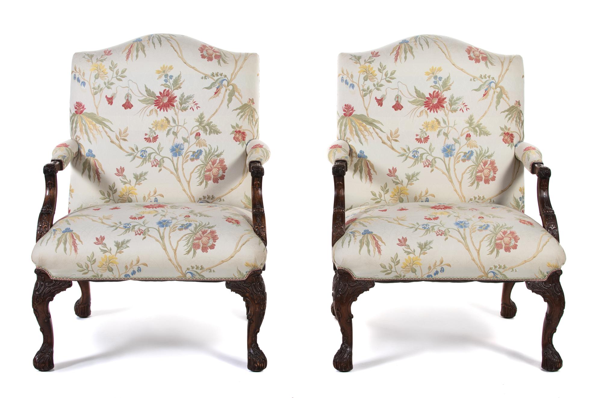 A Pair of George III Style Carved Mahogany Library Armchairs