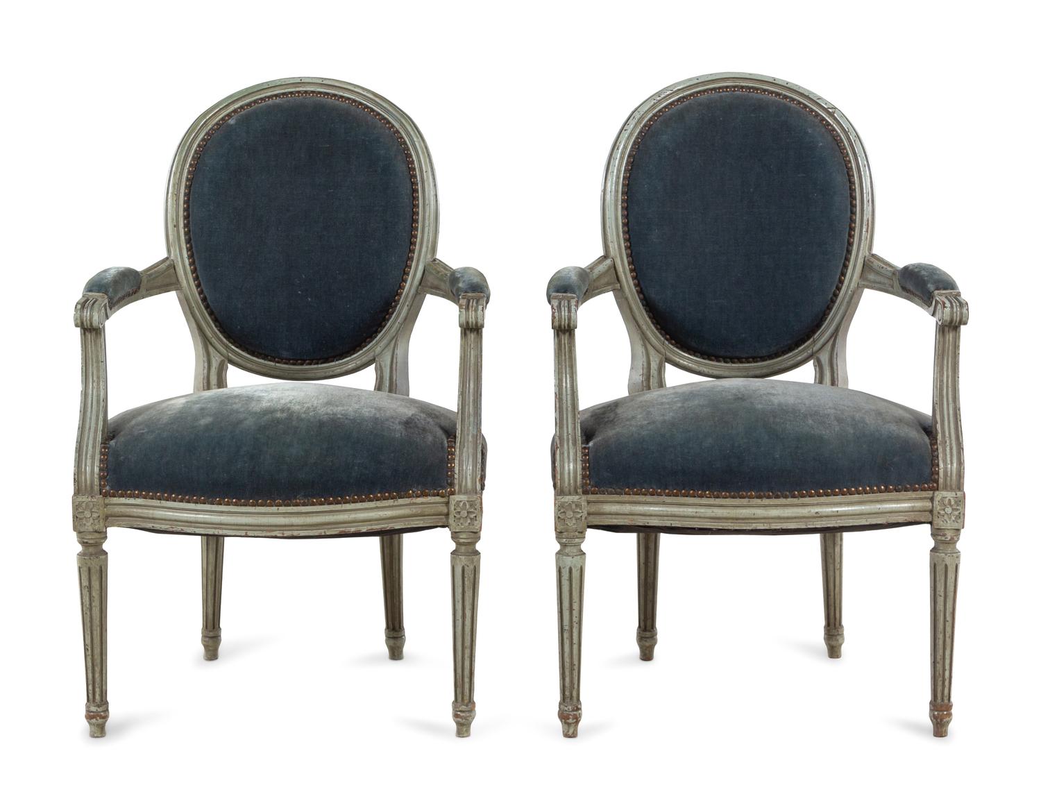 A Pair of Louis XVI Style Painted Fauteuils