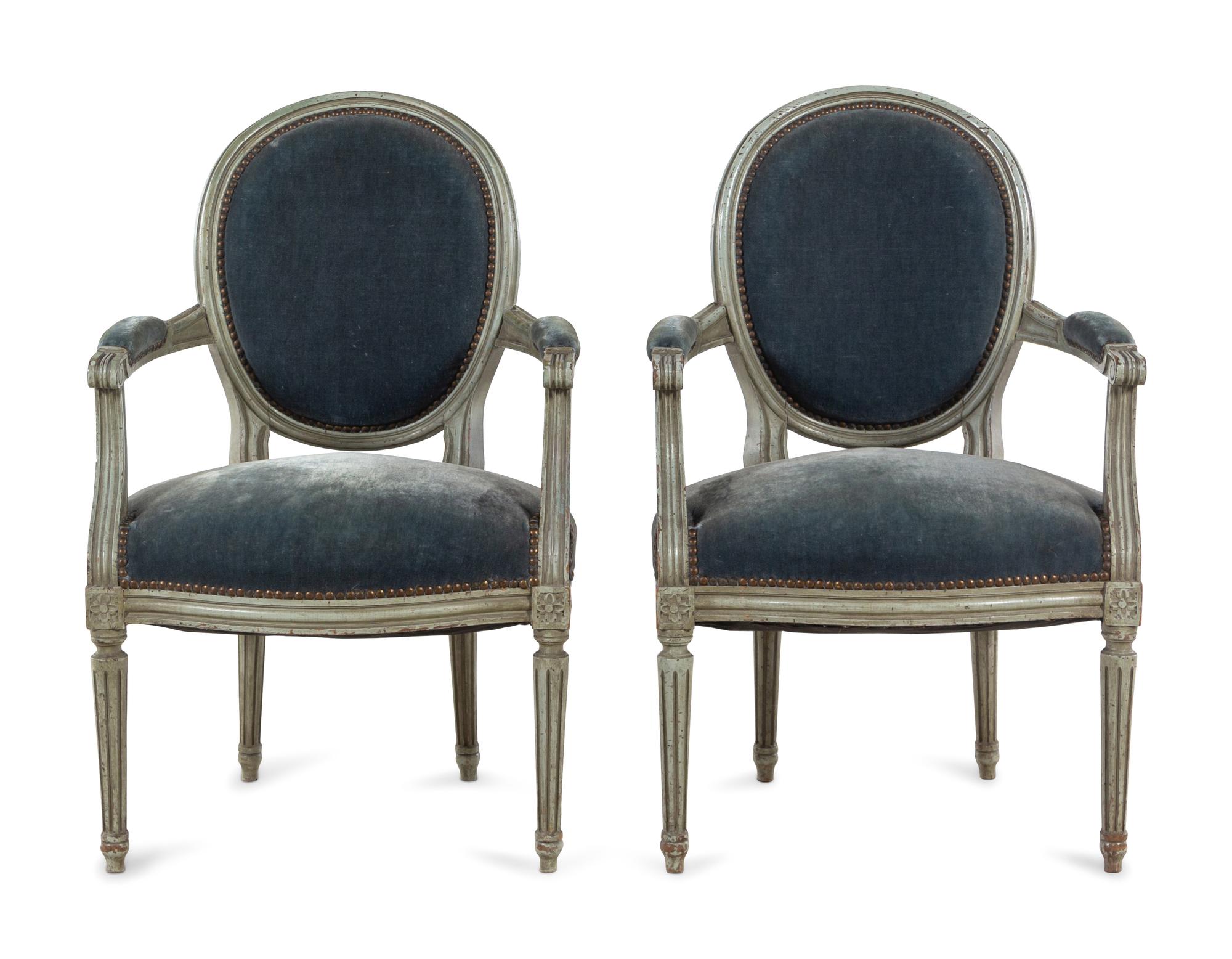 A Pair of Louis XVI Style Painted Fauteuils