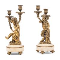 A Pair of French Gilt Bronze and Marble Figural Two-Light Candelabra