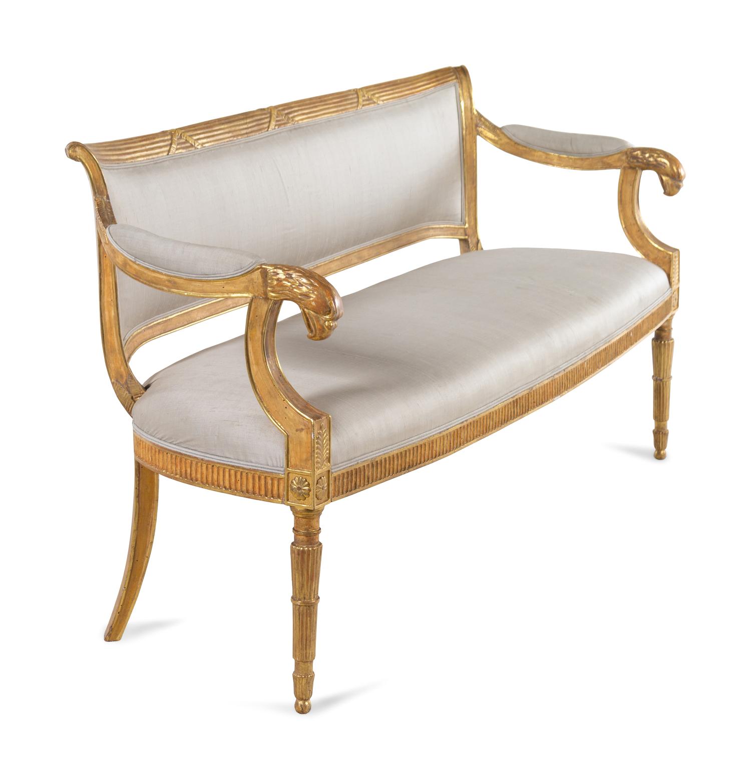 A Pair of Northern Italian Giltwood Sofas with Griffin Supports