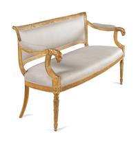 A Pair of Northern Italian Giltwood Sofas with Griffin Supports