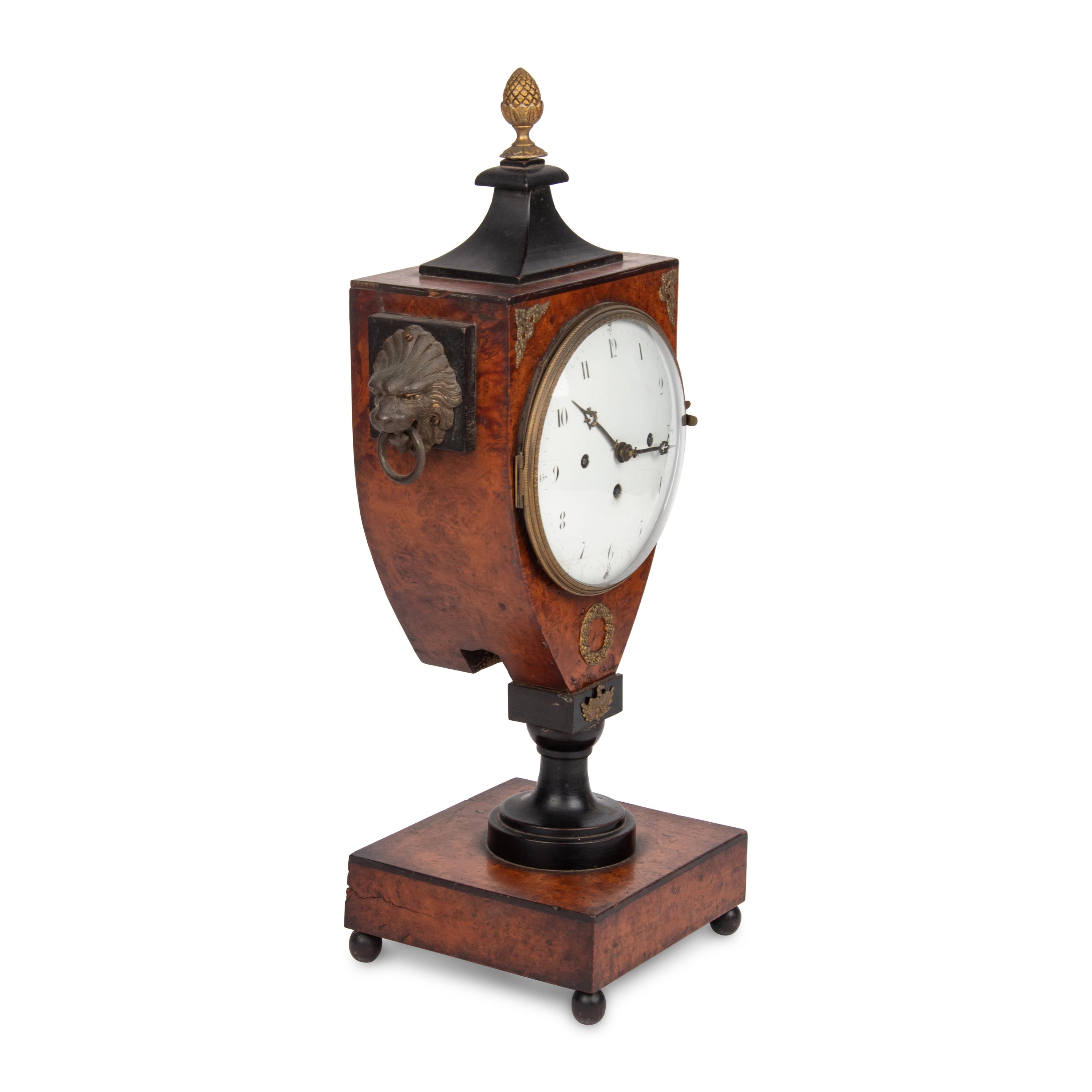 An Empire Style Burl Walnut and Part-Ebonized Mantel Clock