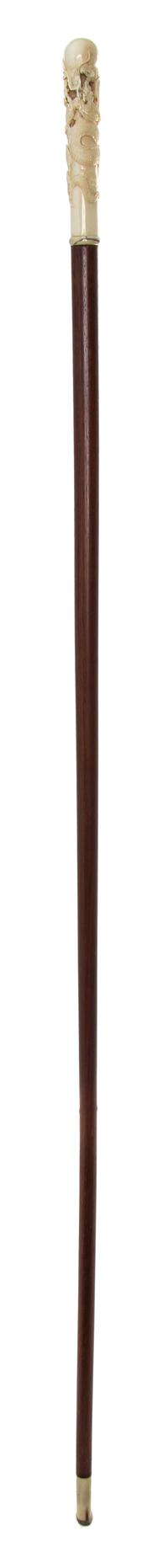 A Chinese Ivory Handled Walking Stick, Length of handle 4 1/2 x length overall 37 3/4 inches.