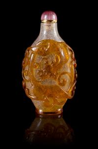An Amber Overlay Clear Glass Snuff Bottle Height 3 1/8 inches. — PROBABLY PALACE WORKSHOPS, 1790-1840