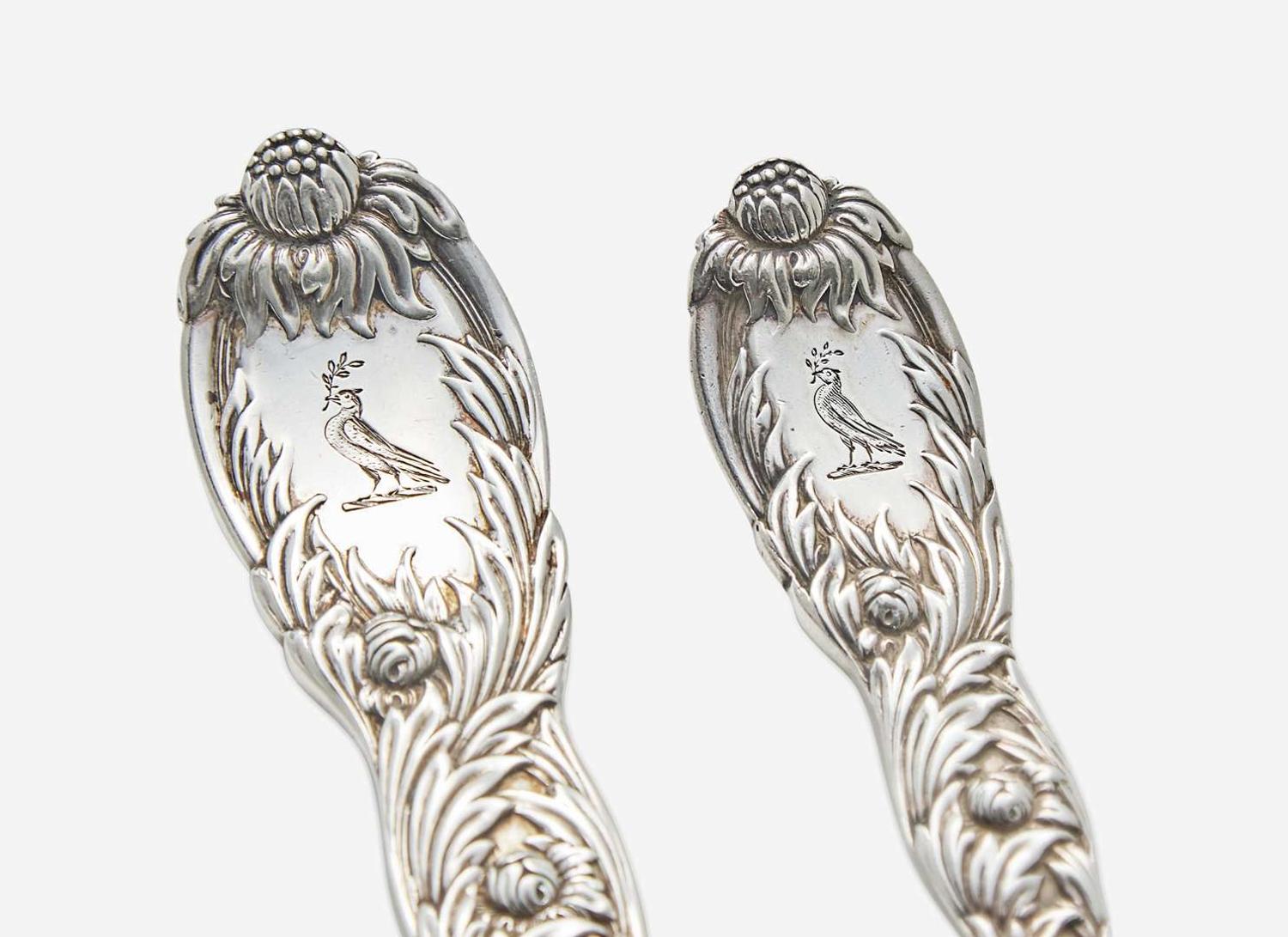 A sterling silver flatware service for eighteen in the "Indian Chrysanthemum" pattern, Tiffany & Co., New York, NY, circa 1880