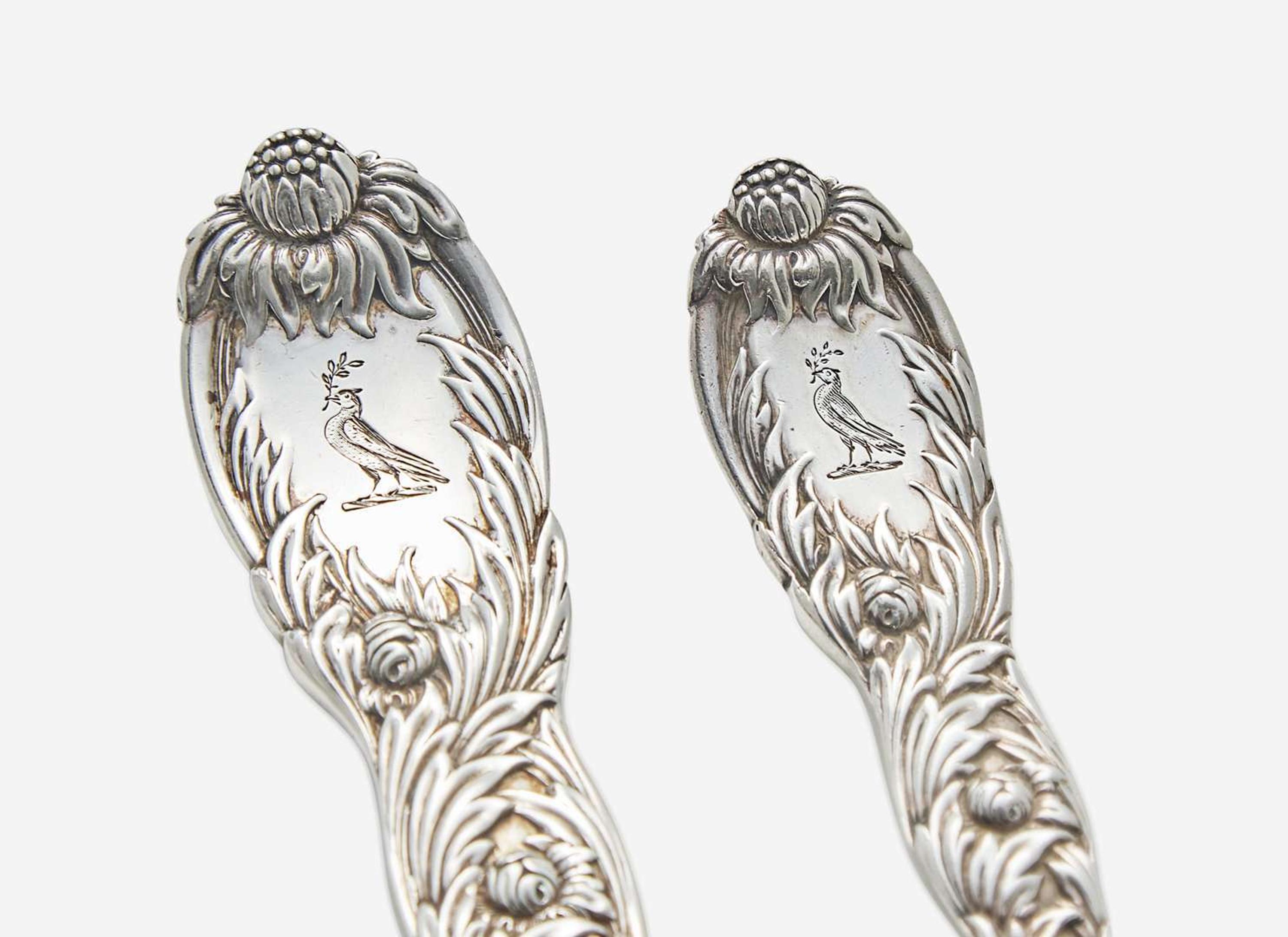 A sterling silver flatware service for eighteen in the "Indian Chrysanthemum" pattern, Tiffany & Co., New York, NY, circa 1880