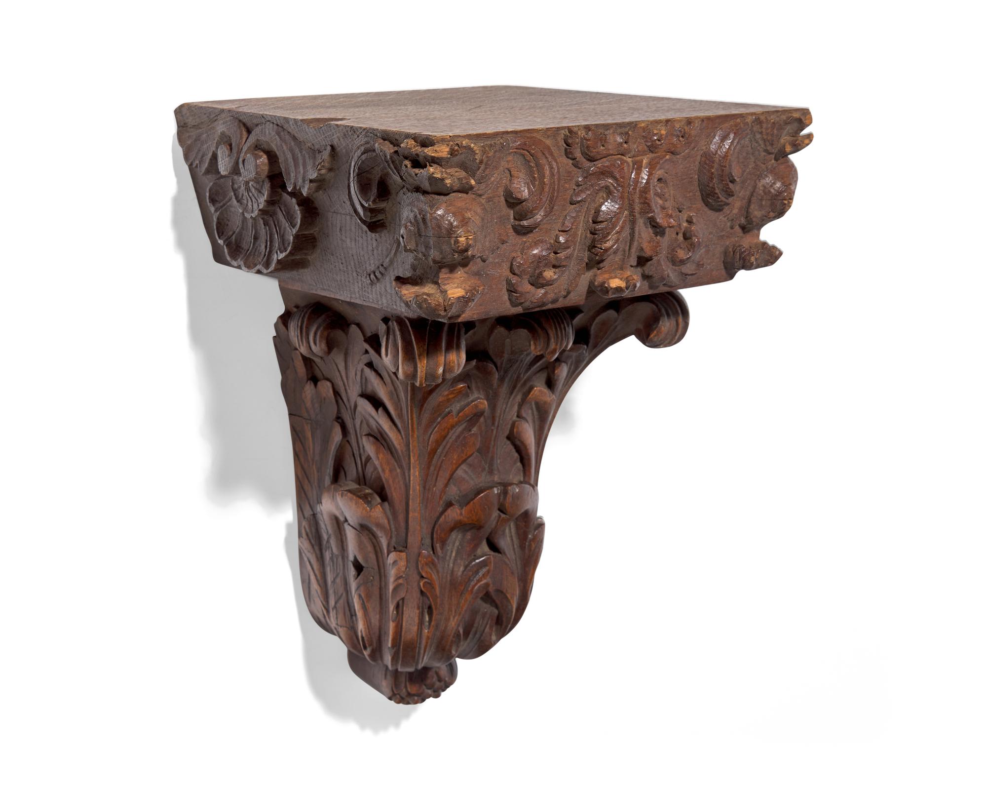 A French carved oak wall bracket and column capital, 18th / 19th century