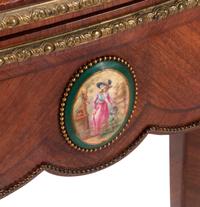 A Pair of Louis XV Style Gilt Bronze and Porcelain Mounted Flip-Top Tables