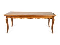 A French Provincial Style Fruitwood Dining Table and Six Side Chairs — 20TH CENTURY