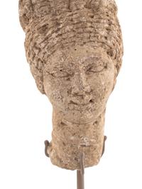A Roman Stone Head of a Woman