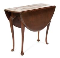 A Queen Anne Style Mahogany Oval Drop Leaf Table Height 27 3/4 x width 37 1/4 inches. — 20TH CENTURY
