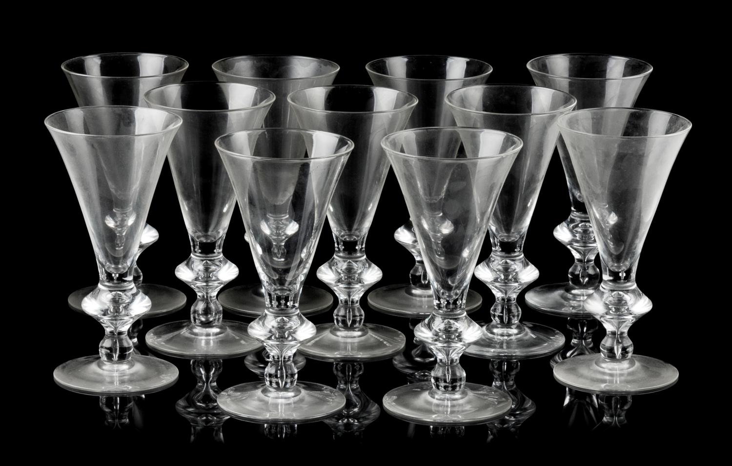 A Set of Eleven Steuben Glass Goblets Height 7 1/2 inches.