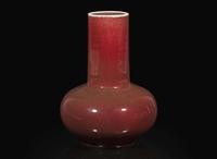 A Chinese "sang de boeuf"-glazed porcelain bottle vase, 18th / early 19th century 牛血紅長頸瓶 十八或十九世紀早期