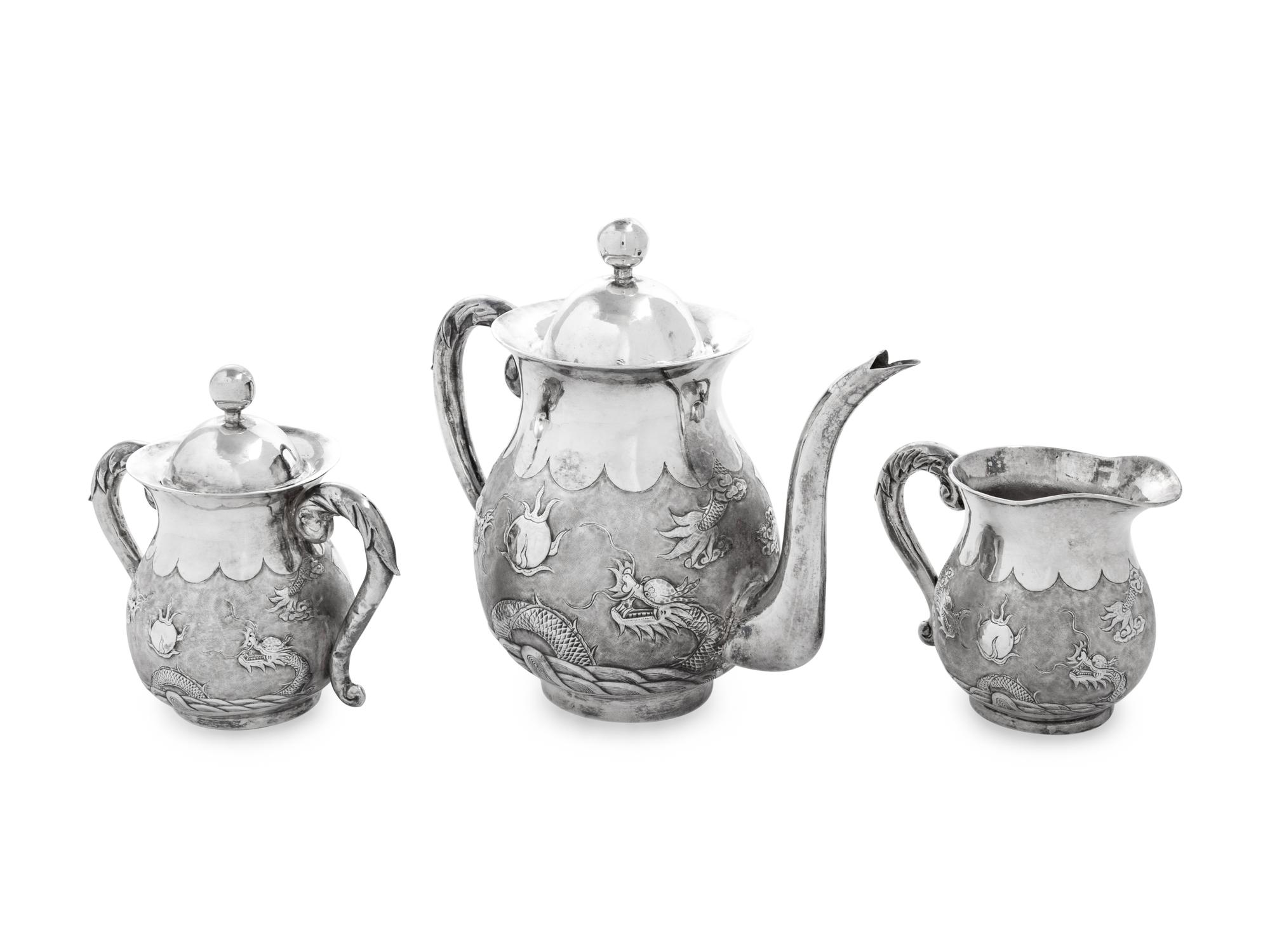 A Japanese Silver Three-Piece Tea Service