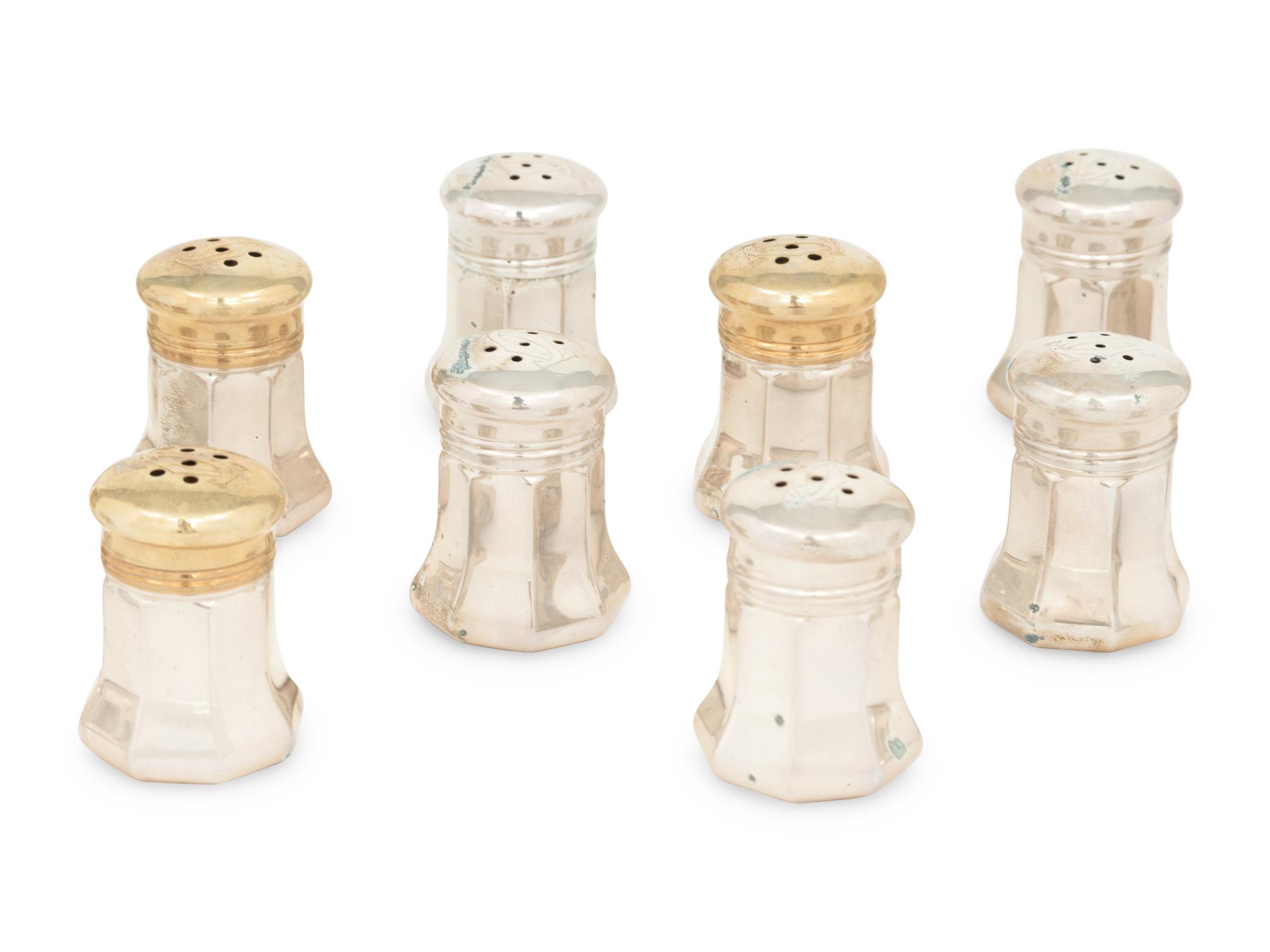Two Cased Sets of Cartier Silver and Silver-Gilt Shakers