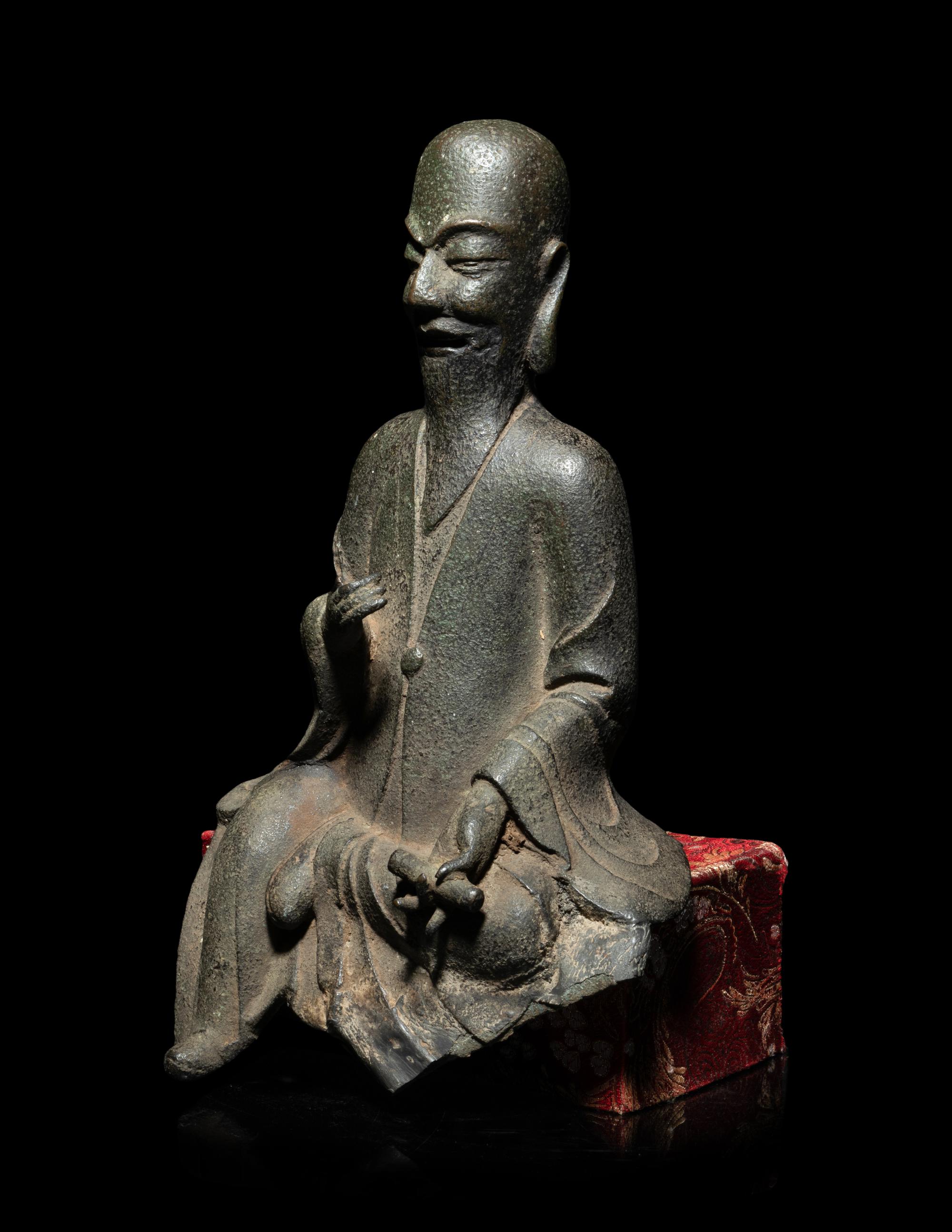 A Chinese Cast Iron Figure of Shoulao , Immortal of Longevity