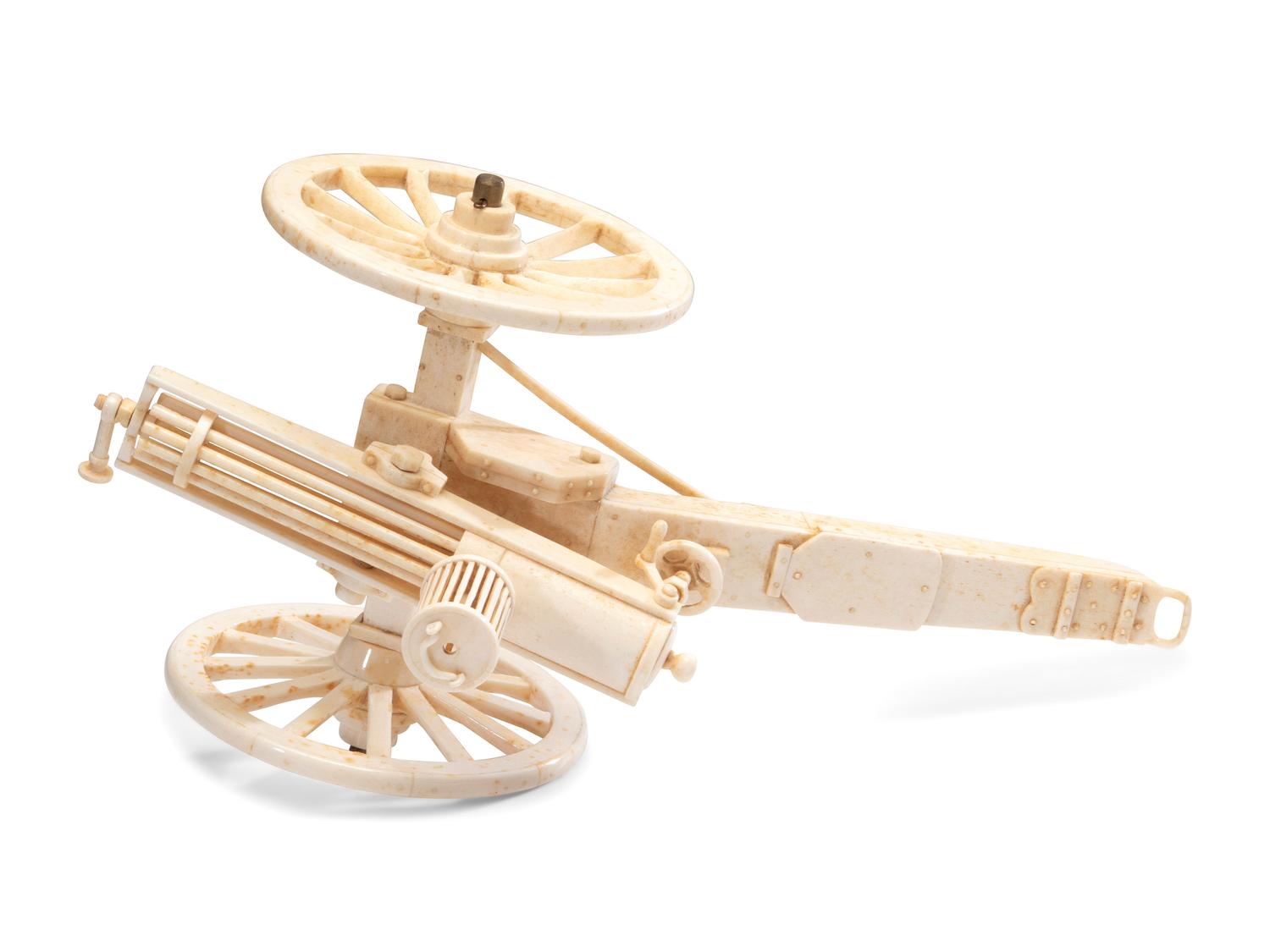 A Carved Walrus Ivory and Bone Gatling Gun Model