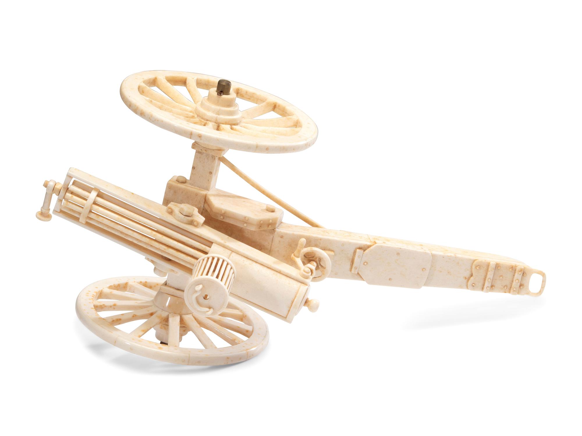 A Carved Walrus Ivory and Bone Gatling Gun Model