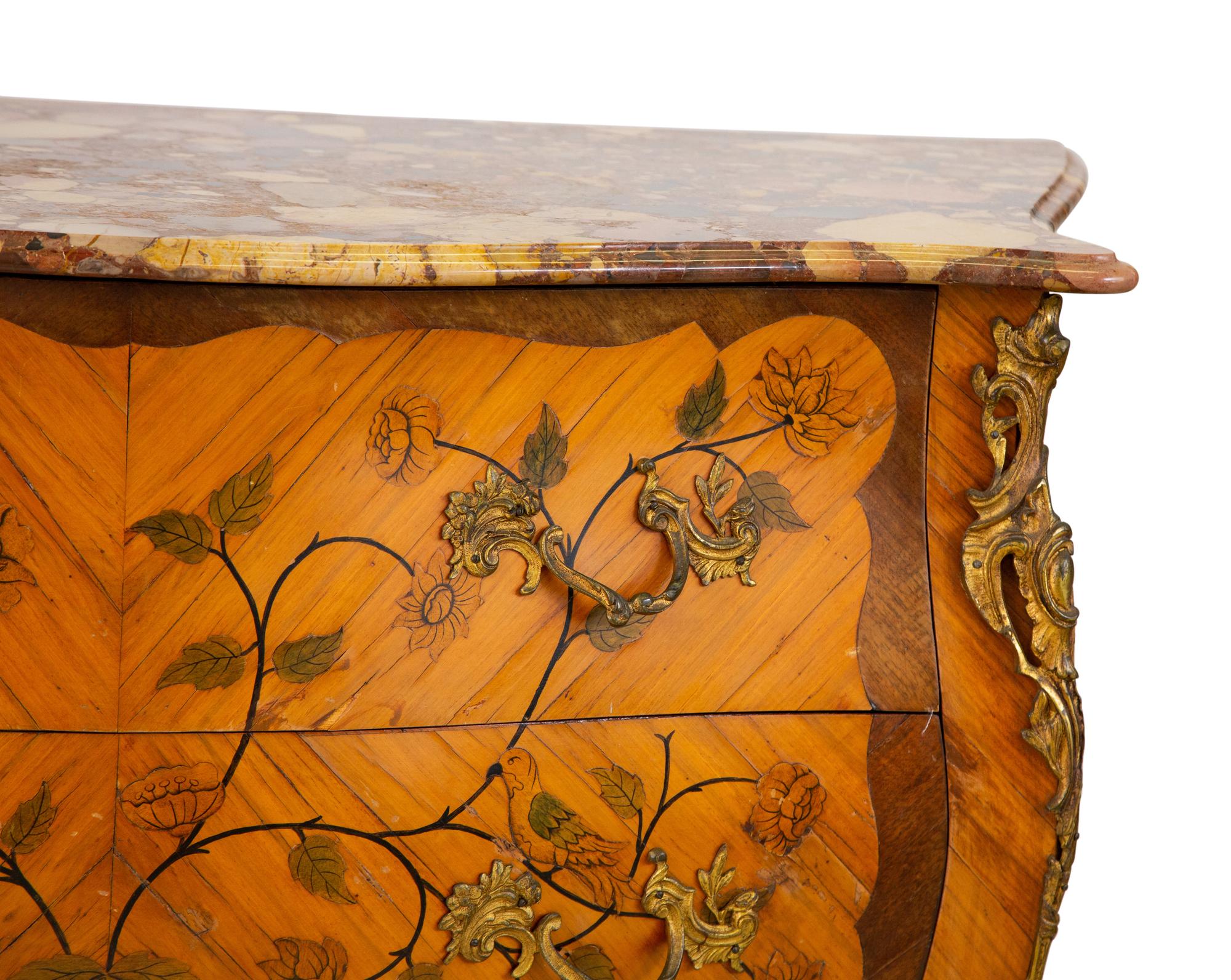 A Louis XV Style Gilt Bronze Mounted Marquetry Marble-Top Commode