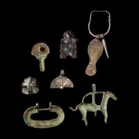 Seven Eurasian Bronze and Silver Items