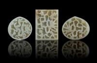 A Group of Three Carved Jade Belt Plaques LIKELY MING DYNASTY Length of largest 2 3/4 inches. — LIKELY MING DYNASTY
